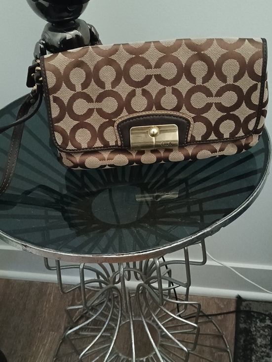 Coach Handbags - Coach Brown and Tan Signature Logo Wristlet with Gold Hardware